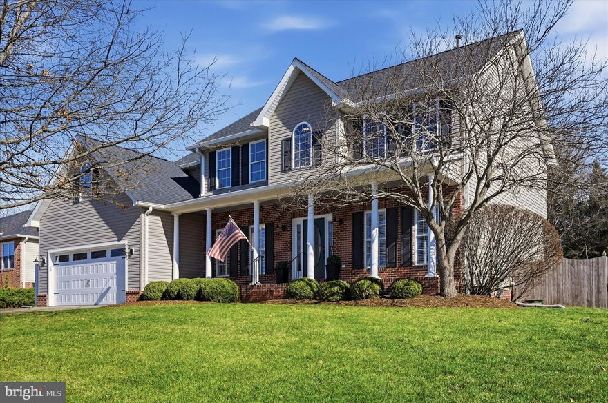 Custom-built 4BR/5BA home with NO HOA and peaceful farm views! Designed with comfort and quality in mind, this beautifully upgraded home features a show-stopping gourmet kitchen with live-edge countertops, matching floating shelves, leathered granite, commercial-grade gas range, and newer appliances.

Upstairs, the primary suite offers a tray ceiling and a spacious bath complete with jetted soaking tub, separate shower, and double vanities. The second bedroom enjoys its own private en-suite with a customized full bath. Bedrooms three and four are generously sized and share a hall bath with tub/shower combination. Convenient bedroom-level laundry adds everyday ease.

Outdoor living shines here—step from the gorgeous screened porch to a flagstone patio and professionally landscaped, fenced backyard backing to open farmland for scenic, unobstructed views.

The finished walk-up basement offers exceptional flexibility for multigenerational living or an extended-stay guest suite, featuring a spacious great room/exercise area, space ready for a kitchenette, a beautifully appointed full bath, a sound-insulated office or bonus room, and a large storage room.

Major improvements include a 2024 roof, renovated kitchen, updated HVAC systems, upgraded electrical panel, radon mitigation system, remodeled baths, and an upgraded two-sided gas fireplace.

Detached 12x20 garage with underground electric and loft storage, plus an enhanced attached garage with EV wiring. Move-in ready and thoughtfully upgraded throughout.