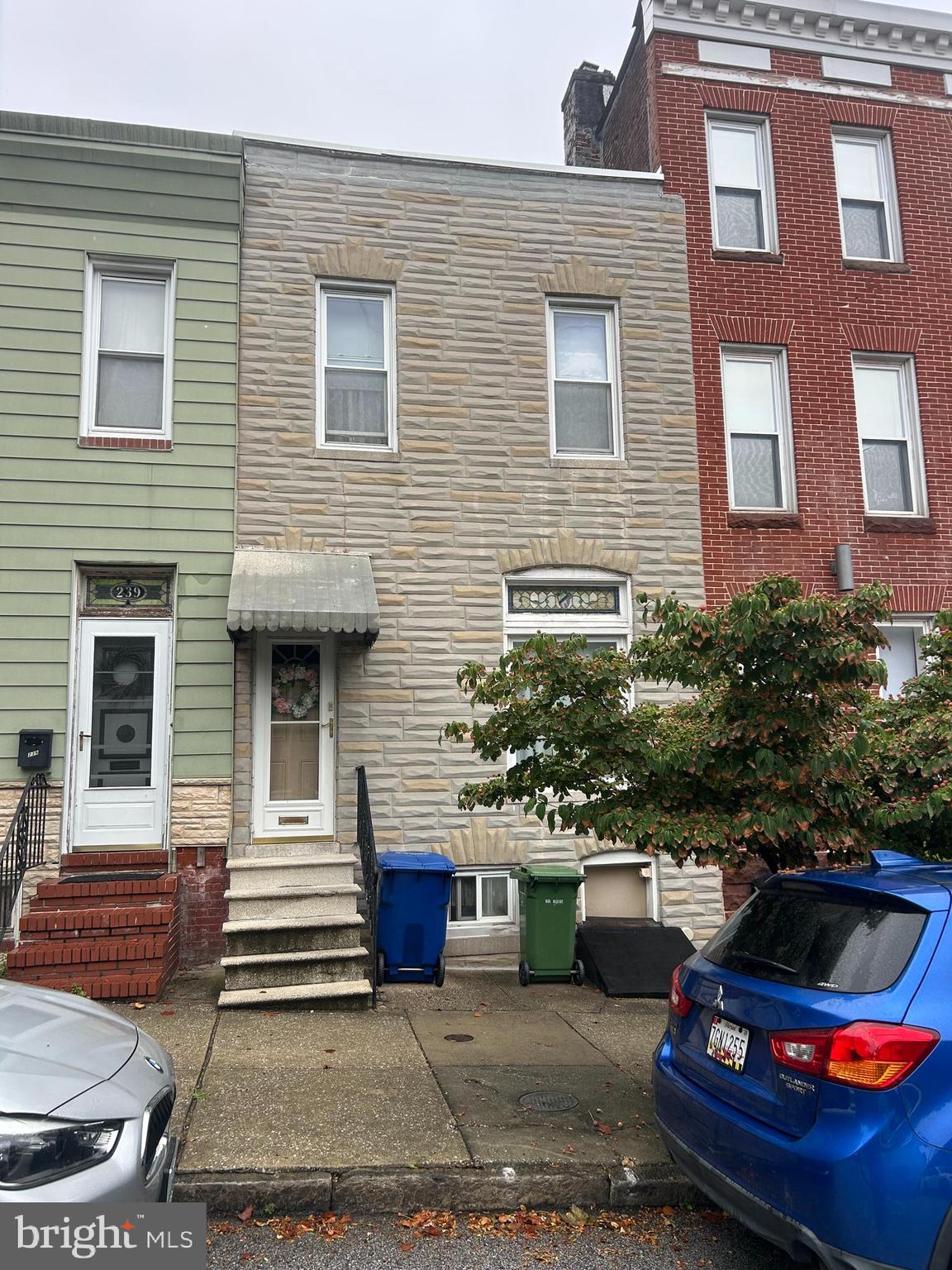 Hurry to this spacious 4 bedroom, 2 bath townhome located in Upper Fells Point! So much potential here.
Original parlor, separate dining room with hardwoods and chair rails, replacement windows, glass block. Kitchen updates include double sink, Corian countertops, dishwasher, built in microwave, wood cabinets. Full size washer and dry conveniently located on the main level along with a full bathroom! There is even a backyard garden. 4 bedrooms (all walkthrough) and a huge bathroom (with clawfoot tub) on the upper level. Over 2,000 sq ft of living space! Unfinished basement for storage and there is a flush in the basement. Close proximity to all Fells Point attractions, Canton, Harbor East, stadiums, marinas, restaurants, shopping. You can see the water from the front steps! Seller cannot make repairs - sold strictly AS IS. All appliances presently in the property will convey. Any furniture left in the property will be the responsibility of the Buyer to remove. Seller needs 24 hour advance notice for all showings. Make your appointment today!!