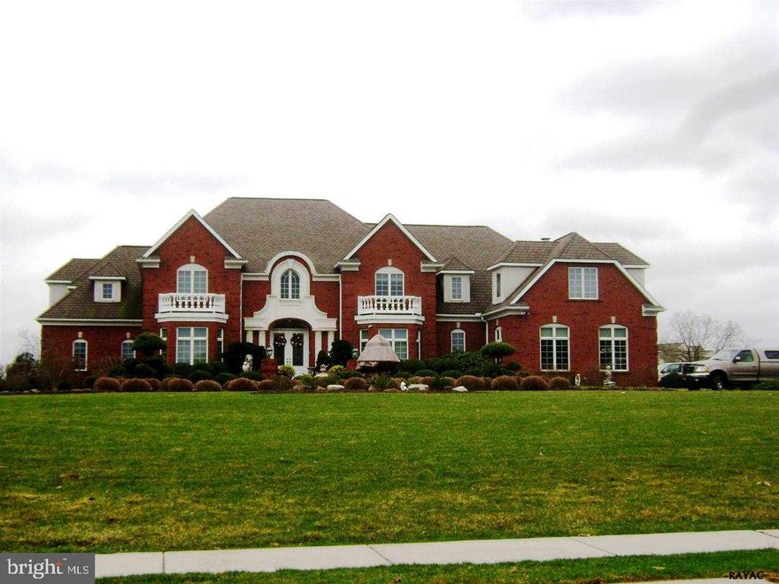 A circular driveway leads to a meticulously maintained home. No detail has been spared! Imported Granite, Artisan Hardwood, Solid Brick Exterior, Full Finished Lower Level includes a Home Theater, Full Kitchen, Hot Tub, and more! Exceptional 3.8 Acre Home Site Overlooks the Exquisite, Private In-Ground Pool. The Perfect Home for the most demanding Buyer!