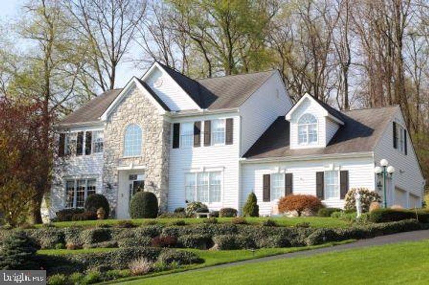 Immaculately maintained custom home features cherry kitchen w/Corian countertops and island. Family room with gas fireplace and columns. Spacious master suite w/large walk-in closet, master bath w/double vanities, whirlpool tub. 3 additional large bedrooms, 3 car garage, fantastic private lot w/ large Trex deck, fantastic large waterfall pond, walking trail around lot perimeter, your own private paradise. Central vac, pre-wired for security and