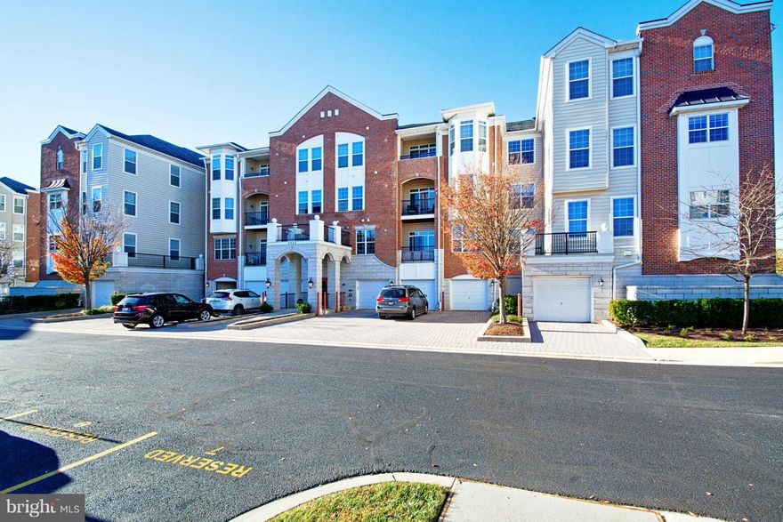 This condo has  2 large bedrooms and a den!! Walk in closet, hardwood floors, crown molding, lots of natural light, private balcony, all appliances, including washer/dryer! Elevator building that is secure. Garage and assigned parking space. Close to shopping, schools and shopping. Condo & HOA fees include Master Ins., snow removal, exterior maintenance.Back on market, pending release.