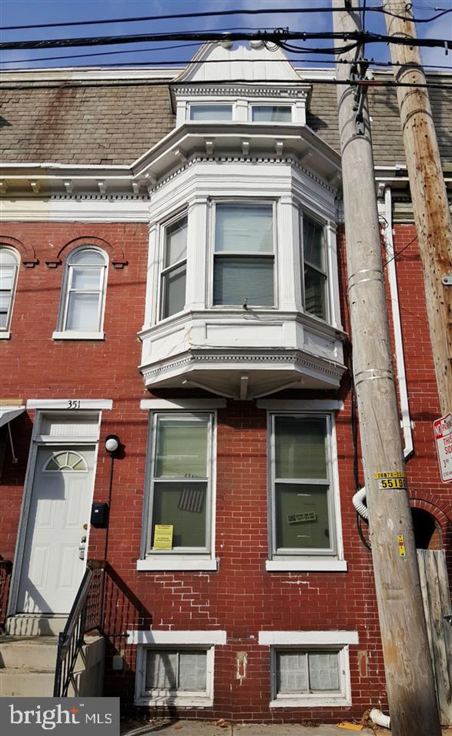 Great Investment Property! Long Term Tenant. Three Story, Five Bedrooms, One Bath Row Home with Full Basement, Yard & Off Street Parking. Call for Details!