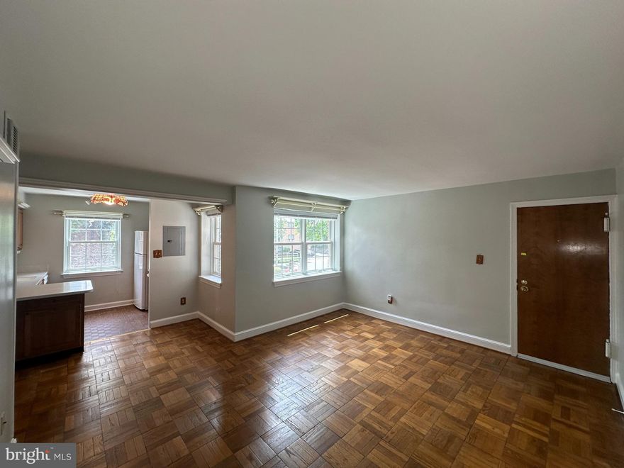 Location!! Location!! Location!! Welcome to this outstanding condo with the “green view” of mature trees in a park-like site.  It is meticulously engaging with detailed touches of fresh paint and ready to be called home. Walk into the airy and sun-filled living room with a beautiful parquet floor, and windows galore enhanced with newly fitted miniblinds. There is a comfortable Corian countertop, large windows, a refrigerator, a dishwasher, a stove, and a microwave. The condominium has two cozy bedrooms with large closets, and it offers a comfortable living space with its self-controlled heat pump and AC. There is a hook-up in the unit for a washing machine. Location!! This condo is in the heart of the city, within walking distance of assorted subways, theaters, the courthouse, restaurants, and supermarkets, and a minute's drive to the airport. The shuttle ART bus stops just steps from the building, making it a prime location to accommodate fast-paced working commuters. This location suits energetic nature lovers who enjoy walking the Custis Trail, baking to parks and George Town. The low condo fee of $ 361.71 includes snow/trash removal, the common area, the exterior of the building maintenance, the parking area, and water/sewer service. A laundry room on the low level is well-equipped to serve all homeowners. The complex offers a storage room and space for bicycle storage.