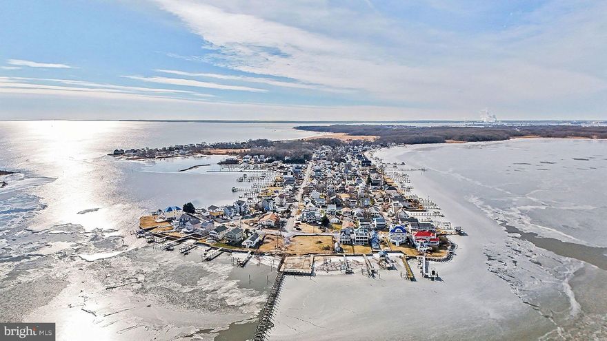 Beautifully Kept Island Retreat | 4 BR | 2.5 BA | Water Views

Get ready to experience the charm of Miller’s Island living in this clean, well-kept, and truly move-in-ready home, set in one of the area’s most sought-after waterfront communities. Featuring an open, airy floor plan designed to bring the outdoors in, this residence offers scenic water views from nearly every vantage point and a layout perfect for both everyday living and entertaining.

The main level welcomes you with hardwood flooring, coffered ceilings, and quality finishes throughout. The kitchen is thoughtfully designed with granite countertops and stainless steel appliances—ideal for home chefs and casual gatherings alike. Cozy up by one of two propane fireplaces, including a private hearth in the spacious primary suite.

Outdoor living shines here with three private decks—perfect for morning coffee or sunset relaxation—plus a large, flat, fully fenced backyard and rear patio, creating an inviting space to unwind or host friends and family. Additional highlights include a paved driveway with ample parking with a dual car garage, a finished lower level, and generous storage throughout.

Located on Miller’s Island, this home offers a top-tier coastal lifestyle with the convenience of walkability to local restaurants, shops, marinas, and island favorites—making it easy to enjoy everything this vibrant waterfront community has to offer. A rare opportunity to own a beautifully kept home in an exceptional location.