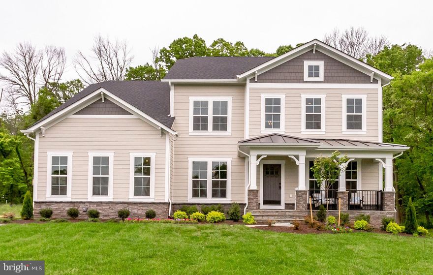 Evergreene Homes brings the Barrett Model to Fairfax, Virginia at Woodson Reserve. This luxury home is perfect for families of all sizes. This homesite is located in a highly ranked school district (Woodson High) for all school levels and is available to move in now!This Barrett Model is a classic craftsman design with an open floor plan and the following features:  5 BD | 4.5 BA | 5,370 SF | Three Car Sideload Garage  Deluxe Kitchen with Upgraded Stainless Steel Appliances  Wideplank Hardwood Flooring  Craftsman Oak Main Stairs  Morning Room and Library on Main Level  Upper Level Laundry Room with Utility Sink  Energy Efficient Home Construction with 2 6 Framing