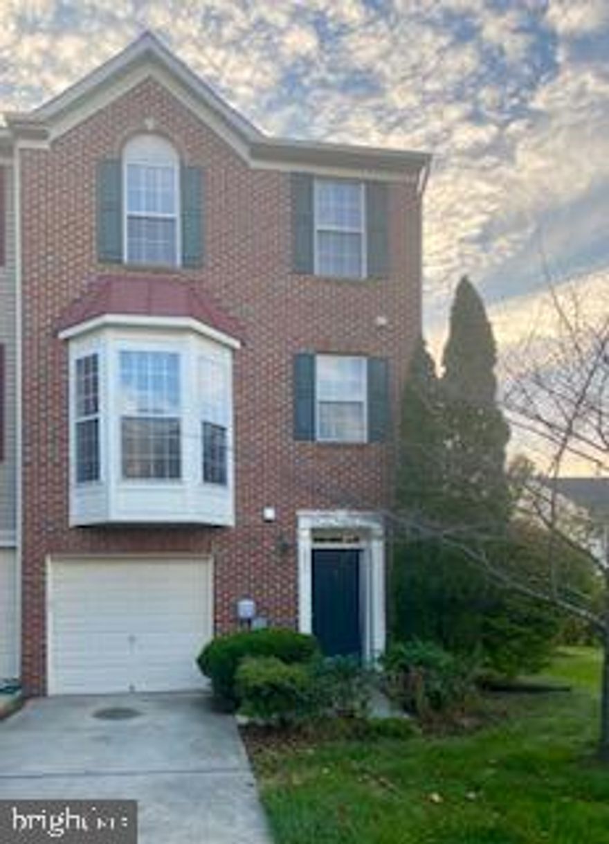 Well maintained and freshly painted end unit at the sought-after Vista Garden Subdivision.