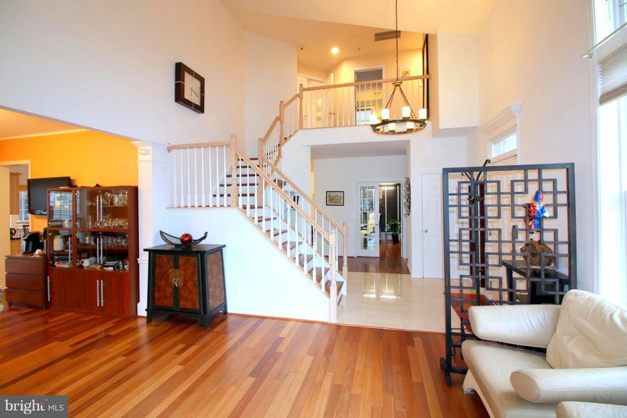 Like a model! Updated from top to bottom. Great Contemporary on Cul-de-Sac. Premium lot  backs to woods. Very private screened  deck.