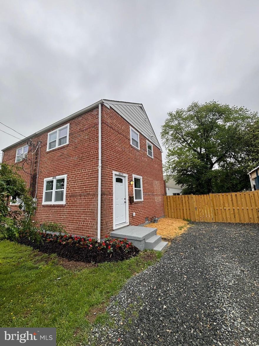 Beautifully updated brick semi-detached home in a desirable and convenient location. The spacious and sun-filled living room flows seamlessly into a gourmet kitchen featuring quartz countertops, upgraded cabinetry, stylish backsplash, and stainless steel appliances. A breakfast bar offers a perfect spot for casual dining.

Gleaming, refinished hardwood floors run throughout both levels. Upstairs, you'll find two generously sized bedrooms and a beautifully renovated full bathroom.

Step out from the kitchen into a fully fenced, expansive backyard complete with new fencing and a patio —ideal for outdoor entertaining. Additional highlights include a brand-new HVAC system and a private driveway offering off-street parking.

Situated directly across from Green Meadow Park, with access to biking and walking trails, this home is also conveniently close to public transportation and a wide array of shopping options.  Agent owner.