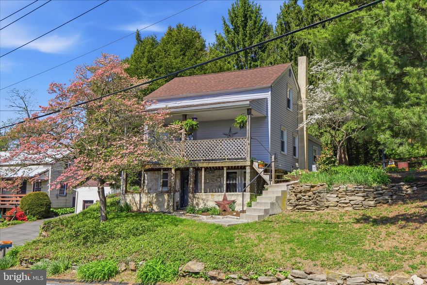 Tucked into a peaceful country setting in Conestoga, 82 River Corner Rd offers a picture-perfect backdrop of open farmland and endless charm. Imagine slow mornings on the back deck with coffee in hand as goats graze in the distance, and summer evenings spent around the fire pit under the stars—this is the kind of setting that instantly feels like home.

Inside, the layout is both cozy and functional, with LVP flooring flowing through the dining and living rooms. The dining room welcomes you in and opens naturally into the living room, creating an easy, connected feel. Just beyond, the spacious kitchen offers an eat-in area—perfect for casual meals and everyday living. A full bath with stall shower and convenient main floor laundry round out the first level.

Upstairs, the home continues its charm with a comfortable bedroom and a versatile landing that works beautifully as a reading nook, home office, or quiet retreat.

Outside is where this property truly shines—from the inviting front porch to the back deck overlooking the farmland, every space is designed to help you slow down and enjoy your surroundings. A paved driveway provides ample parking, and the location offers the best of both worlds: peaceful country living just minutes from the city.

Whether you're stepping into homeownership for the first time or simply craving a quieter lifestyle, this home delivers a setting that’s as special as it is inviting. You won't want to miss this one!