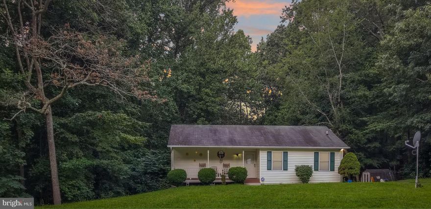 NOTHING TO DO BUT MOVE IN! This lovely 4 bedroom 3 full bath 2 level Rambler on 1.19 acres. New HVAC unit, new roof, new radon mitigation system, freshly painted and newly carpeted. Main level includes MB with full bath. Sliding glass doors out to 2 level deck.  Lower level has a separate entrance with open space that can serve as a family room. Also includes a huge Laundry Room/Kitchenette, Full Bath, and 2 additional rooms that can serve as a home gym and bedroom. The choices are yours.