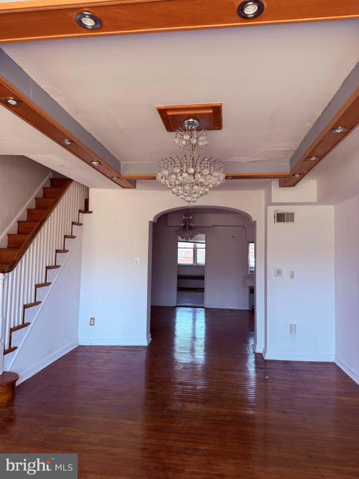 Well maintained row home in Mayfair! Hardwood floors . Tiled hall bath. 1-car attached garage & driveway. Huge eat-in kitchen with tons of cabinet space. Finished basement with built-in bar. Large room sizes. Concrete patio in front of home. Minutes from all major roadways. Close to all amenities.