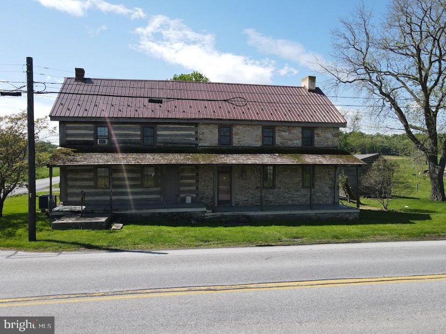This property will be offered at Public Auction on Tuesday, June 16, 2026 @ 6pm.  The listing price is the opening bid only and in no way reflects the final sale price.  10% down due at auction, 2% transfer tax to be paid by the purchaser, real estate taxes prorated. Parcel 1 (736 Strasburg Rd) offers a spacious layout beginning with a first floor that includes an entryway, a living room, a kitchen featuring a walk-in fireplace, a dining room, a laundry room with side entrance, and a sun porch that brings in natural light. Upstairs, the second floor provides a landing area, three bedrooms, an additional bedroom that could also function as an office, a sitting room, a loft/library, and a full bathroom. This home has retained its historic charm, featuring exposed logs, original architectural details, and woodwork, and is in need of cosmetic restoration. The exterior includes an oversized detached two-car garage, a brick patio, a deck, and a covered front porch.