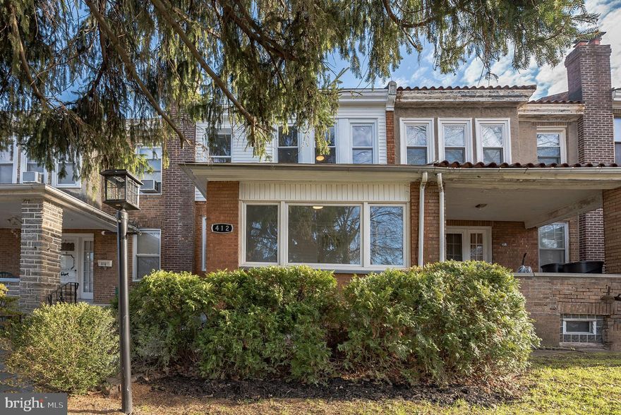 Welcome to 412 E. Montana, a beautiful tree-lined street in the Mt. Airy section of Philadelphia.   Completely renovated in 2020, the open living room features hardwood floors, crown molding, and recessed lighting.  The spacious dining room is large enough for family gatherings or dinner parties.   The modern kitchen features white shaker cabinets, quartz countertops, stainless steel LG appliances,  large bi-level peninsula, and separate pantry.  Step off onto your private deck on the back, perfect for outdoor dining and gathering . On the second floor there are three bright bedrooms filled with natural light and completed by a custom tiled bathroom with tub/shower combo.  The basement is completely finished with laminate flooring, stone wall features, recessed lighting, full bath with stall shower, and laundry.  This home has a 1 car garage with an additional one space behind it in the private driveway.  Mt. Airy is one of Philadelphia's hottest communities, with its easy accessibility to Center City, Fairmount Park, and major highways.
