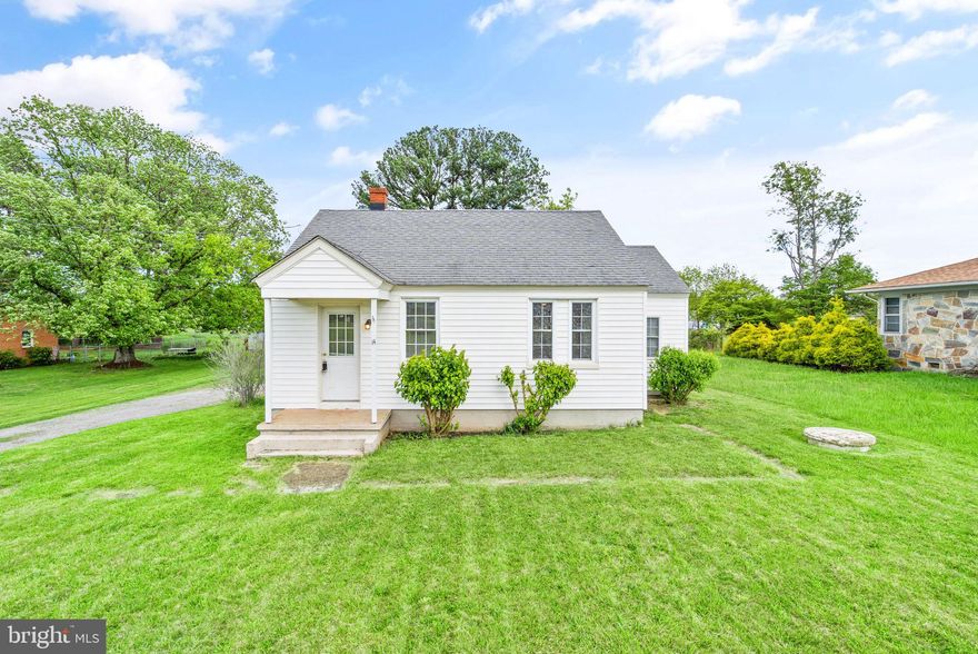 Charming 2 bedroom 1 bathroom home in Fredericksburg! Perfect starter home or investment opportunity with no HOA. This home features real hardwood floors throughout. The main level features the kitchen, living room, two bedrooms, and a full bathroom. Make your way upstairs to find another large living area that is ready for your own personal touch. The spacious yard is a third of an acre - perfect for entertaining! Recent updates include the oil furnace (2023) and water heater (2017). Close proximity to shops and major commuter routes!