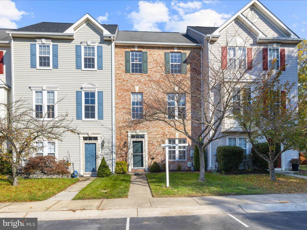 Welcome to this stunning three-story townhome, meticulously renovated to blend modern elegance with comfort. This bright and airy space features an open-concept layout.  A spacious living area opens to a gourmet kitchen equipped with stainless steel appliances and quartz countertops. Enjoy your morning coffee on the private balcony or unwind in the cozy ground floor rec-room with dry bar.  The upper level offers a primary bedroom including a newly remodeled ensuite with a walk-in closet and two additional bedrooms and bathroom. Located in a vibrant community, residents can take advantage of exceptional amenities including a state-of-the-art pool, tennis/pickleball courts, beautifully landscaped walking trails, and tot lots throughout. With convenient access to shopping, dining, and local parks, this townhome is the perfect retreat for those seeking both luxury and lifestyle. Newly re-zoned into the Chesapeake school district!