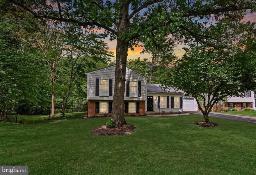 Fantastic value in the heart of Vienna - offering an unbeatable combination of location, lot size, top-rated schools and thoughtful updates! Charming split-level home boasts 4 bedrooms, 3 full baths, and an attached 1 car garage. Situated just outside the Town of Vienna boundaries, so buyers can enjoy the best of both worlds: the convenience of living 3/4 of a mile from Maple Ave without those extra Town taxes!!! The main level features sleek luxury vinyl plank flooring, recessed light and an open floorplan that feels bright and welcoming. In the kitchen you'll find granite countertops, subway tile backsplash, and breakfast bar with pendant lighting, perfect for casual mornings. The sliding door from the dining room leads out to a large rear deck (boards replaced in 2025) where you can unwind while enjoying tree-lined views towards the nearby W&D Trail. The rare .4 acre lot offers space and privacy that's increasingly hard to come by - especially at this price point! Upstairs the primary bedroom includes an en-suite bathroom with tiled shower and frameless glass door; the 2 additional upper level baths share an updated hall bath. The lower level offers exceptional flexibility with LVP flooring, a generously sized family room, full bath and 4th bedroom that could also easily function as a guest suite, home office or gym!  This location truly checks all the boxes. Popular Madison High School pyramid - CHECK! Convenience for commuters? Try access to both Orange and Silver Line Metro Stations, major roads and local bus routes! Entertainment? The shops, restaurants and community events along Maple Avenue and Church St are less than a mile away! And within just a few miles you'll find Tysons Corner, the Mosaic District, summer concerts at Wolf Trap and the natural beauty of the Meadowlark Botanical Gardens!!  Opportunities like this don't come along that often! 2 weekend open houses Sat and Sun 1-3 pm!