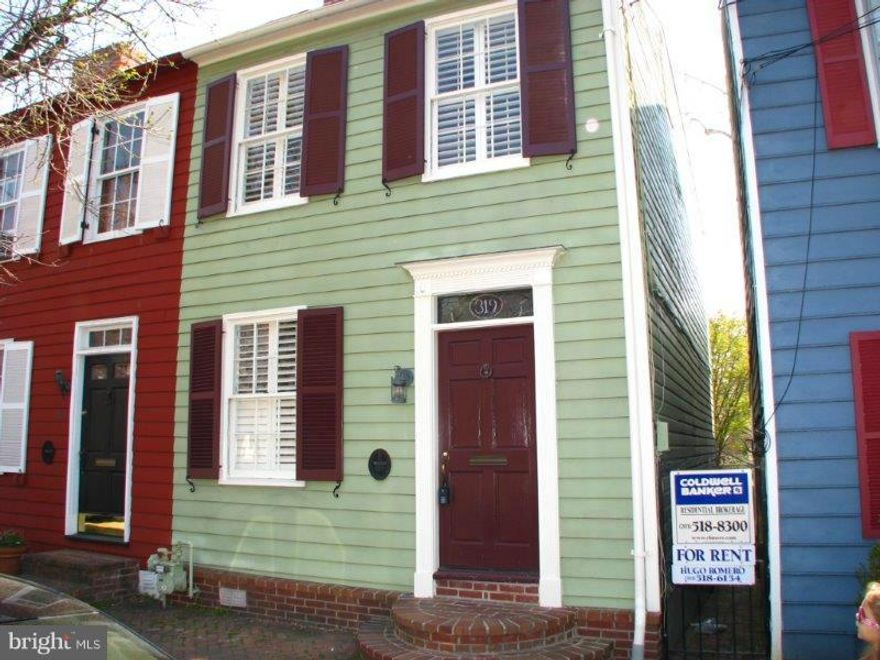 Modern interior in historic Old Town home.  Just 2.5 blks from King St.  Original pine wood floors, high ceilings, elegant moldings, brand new kitchen features elegant granite counters, white cabinets, glass doors & SS appliances. Modern bathroom with double vanities. Central heating & A/C, Plenty of storage in finished attic.  Private, cozy patio on spacious backyard & off-street parking.