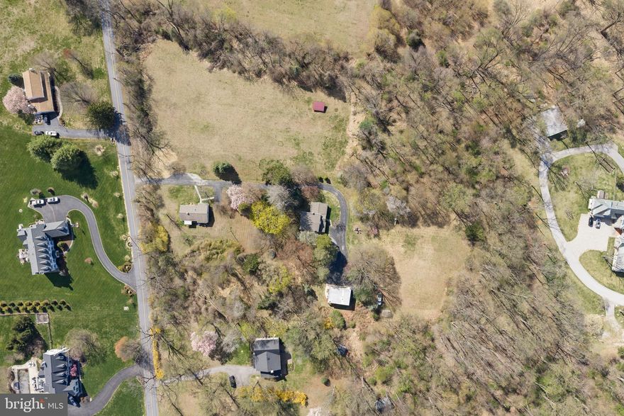 "Diamond Meadows" has "LOTS" of POSSIBILITIES- as a private Country Getaway w/ 3 dwellings on 7.2 acres, or subdivide & probably get 3  LOTS! Very RARE to find a property like this - Peace & Quiet that comes from being able to look 360 degrees & only see your property, yet just mins. to the Main Line - Must see to appreciate the panoramic views! OPEN SUN. 4.11 from 1 to 3! Subdivision started - may be able to have 3 existing dwellings on 1 LOT, & potentially 2 building LOTS that can fit larger homes, pools, barns- like across Diamond Rock!  You can finally get what you've been looking for- whether it's  a family compound, room to run if you have horses, play sports, build the dream house you have plans for, or just relax & watch the sunset in peaceful privacy!  Many updates inc: NEW Septic for Main House & Studio, Newer Roofs, & newer MH heater -so you can move right in! Main House has 4 BRs, 2 Bths, Caretaker's Cottage has 2 BRs, 1 Bth, & Apartment above oversized Garage has 1 BR & 1 Bath.  If you want to bring your horses - there's  2 nice Meadows, one w/ stone run in shed w/ feed bin, & one w/newer storage shed, all bordered by mature trees..  "Diamond Meadows"  has a stone wall fronting the quiet part of Diamond Rock - near Clothier Springs & Horshoetrail, w/ houses across the street backing to Valley Forge Woods & Phoenixville Country Club.   Caretaker's Cottage has 1 floor living: Family Rm, 2 BRs, 1 full Bath w/ skylight, Laundry Room, Kitchen open to DR w/ picture window, & full bsmtt.  Next up the drive is Main House w/ a Great Rm that's width of building, &has superb light from 3 walls of windows, w/ 4th wall having a section of stone & flue for potential wood stove.   Spacious eat in Kitchen w/ Butler's Pantry & door to back yard.  Also on this floor is a sunny Dining Rm, Full Bath w/tub, & big Laundry/Mudroom.   Upstairs are  4 large Bedrooms & full Bath, all w/ good sized closets,   At the end of the driveway is an oversized detached Garage w/ big Laundry/ Storage Rm on main floor & upstairs is a charming Apartment that would be  perfect for an Artist's  Studio  as there is lots of light from many windows & a big picture window in the Bedroom.  Open floorplan has Kitchen open to Family Rm.  & Dining area.   Full Bath completes this space.  Whatever you choose to do w/ this private property on 7.2 acres, don't wait to get started, because there hasn't been an opportunity like this in a long time - a canvas ready for your ideas - family compound,  farmette for horses, fields of flowers or holisitic gardening to be self sustaining! This desirable location lets you get everywhere quickly, & lets you live in harmony w/ nature & truly appreciate what a level 7.2 acres on VF MTN. provides. This homestead was started in 1920 by the Woodward family, who owned a Hat Shoppe in Phila.  Close to the Main Line, but calm in the country!  Seller has started engineering work for potential subdivision, & LOT #1 may be available as the perfect family compound w/ 3 structuress, & then have 2 building LOTS !  See attached Plot Plans in documents or call Missy for updated info. Excellent location close to it all - the Main Line, Paoli Hospital & train,  Hip & Happening Phoenixville, Valley Forge Park, King of Prussia,  the turnpike, Rts. 202 & 422. Really does have so much to offer - are you ready to make your dreams come true? The main house homesite gets fabulous southern exposure - it was chosen in 1920 by the Woodward family, who owned a Hat Shoppe in Phila.  Potential to add a MBR over the Great Room and many other ideas so this Homestead will continue- what will it be for you?  COME SEE the panoramic views on SUN. 4/12 Open House 1 to 3 - LOTS  of Possibilities!