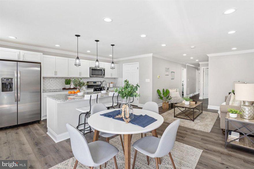 Stunning 3 Bedroom 2 Full Bathroom Rancher In Halethorpe! Walk-In And Enjoy An Open Floor Plan, Recessed Lighting, Hardwood Flooring and Beautiful Details Put Into This Home. The Main Level Offers A Gorgeous Kitchen/Dining Room Combination With Granite Countertops, Tile Backsplash, Stainless Steel Appliances, Recessed Lighting, & Kitchen Island With Breakfast Bar. Continuing Throughout The Home Is The Living Room Perfect For Entertaining Guest, A Primary Bedroom Which Offers A Private Bathroom and Two Additional Spacious Bedrooms With A Full Bathroom & Ample Closet Space. The Backyard Offers A Shed With A 1 Car Garage for Additional Storage.