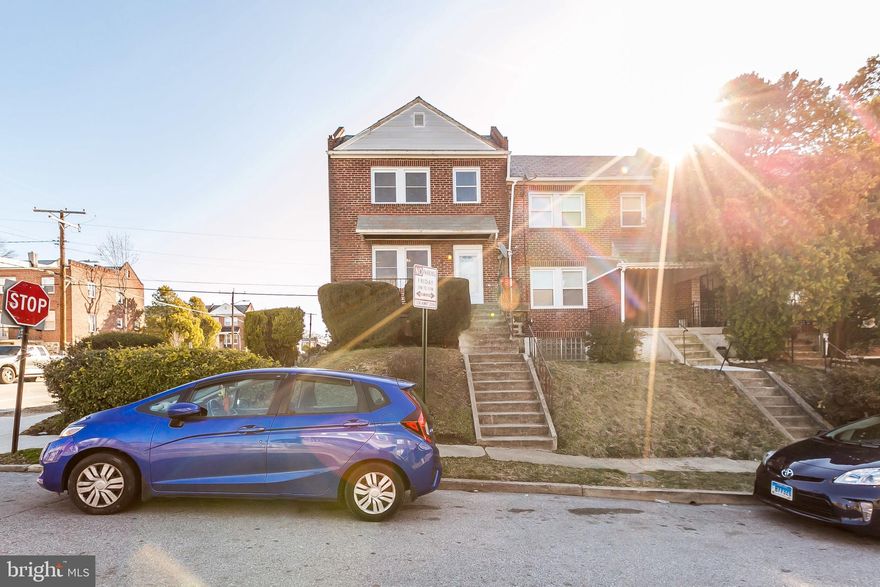 Opportunity Knocks! Recently renovated move-in ready end of group rowhouse with lots of natural light. Brand new water line from the street to the house. The main house features new windows, neutral paint, new carpet, new appliances in the kitchen, new upper level full bath and more. 1 car parking pad and potential for 2nd possible. One of the few houses on the block with a back deck.