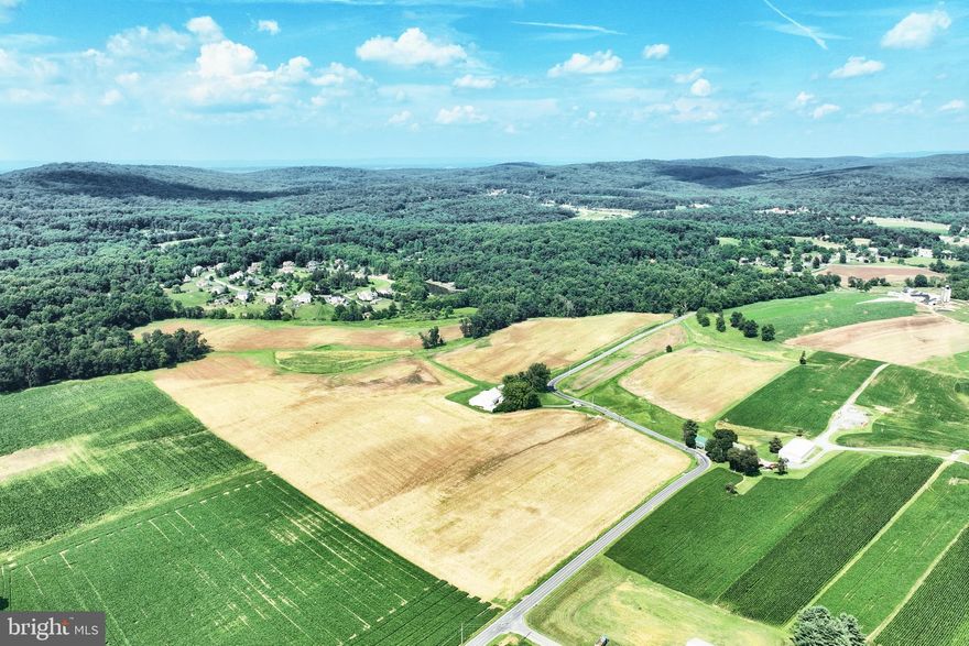Beautiful 93 acre working farm in highly desirable Rapho Township. 5 bedroom, 2 bath, 2,400 sq ft farmhouse that is currently split into 2 apartments, could easily be converted back to a single dwelling. Large bank barn. Approximately 72 acres tillable, mostly high quality silt loam soils. Balance of the acreage is pasture and woods with hunting opportunity. Land is preserved.