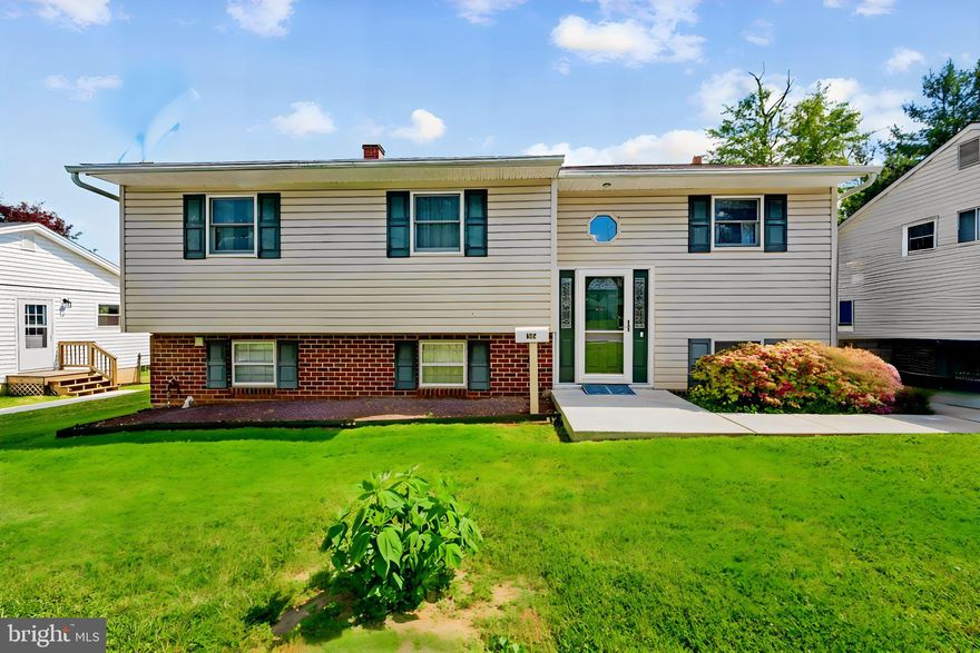 Beautifully maintained split-foyer home offering 4 bedrooms and timeless charm in a convenient Reisterstown location! Lovingly cared for by the current owners for many years, this home combines warmth, character, and thoughtful updates throughout.

Step inside to discover stunning hickory wood flooring throughout the main level and a bright, inviting living room featuring a beautiful large bay window that fills the space with natural light. The tastefully updated eat-in kitchen offers 42-inch cabinetry, granite countertops, stainless steel appliances, and ample space for everyday living and entertaining. Just off the kitchen, the dining room provides the perfect setting for gatherings and leads to a gorgeous screened-in porch, ideal for enjoying your morning coffee or relaxing evenings overlooking the backyard.

The main level also features three generously sized bedrooms and a beautifully updated full bath with tasteful finishes.

The lower level offers even more living space with a cozy recreation room anchored by a striking brick fireplace and hearth with a wood-burning insert stove, creating the perfect atmosphere for relaxing on cooler evenings. A fourth bedroom, laundry area, storage room, and walkout access through sliding doors to a rear patio add flexibility and convenience.

Outside, enjoy a fenced backyard complete with a shed for additional storage, offering plenty of space for entertaining, gardening, or pets.

Conveniently located near shopping, dining, and commuter routes, this charming home is truly move-in ready and waiting for its next owners to enjoy all it has to offer!