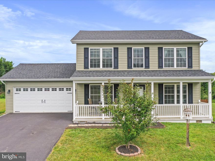 Don't miss out on this gorgeous two story Colonial in the Pebble Ridge Community. Located just minutes away from 81 and route 9. Already has established landscaping, a custom fence and a huge double door storage shed located in the back yard. First floor contains the living area, dining room, kitchen and a half bath when you first enter the house as well as a doorway into the garage. Upstairs has two full bathrooms and that is also where the 3 bedrooms are located. The kitchen currently has a gas range installed, current owner is renting the tank. Buyer can continue the contract for the tank or remove it and install an electric range if they so choose. All appliances were upgraded from the builders standard selection. A commercial Grade hot water heater was also added to the house when it was first constructed. Plenty of cabinets, pantry, and granite counter top. The home has a different heat pump for the upstairs and downstairs enabling owner to only cool or heat the part of the home they are currently using! Run them both at the same time or independently. Back yard has a great deck for entertaining or lounging. Custom 16x10x12 (12 Feet high at highest point) double door barn with windows and rain water collection off the rear. Water collects into food grade barrels to water the vegetable garden for a nice self sustaining food source. 4 vegetable garden beds. Rear of property backs to HOA land that will not be used to build homes giving a great sense of privacy. View of the Blue Ridge mountains from the front of home. Crawl Space was completely encapsulated and a sump pump was installed 8-13-25 Receipt is in the documents.