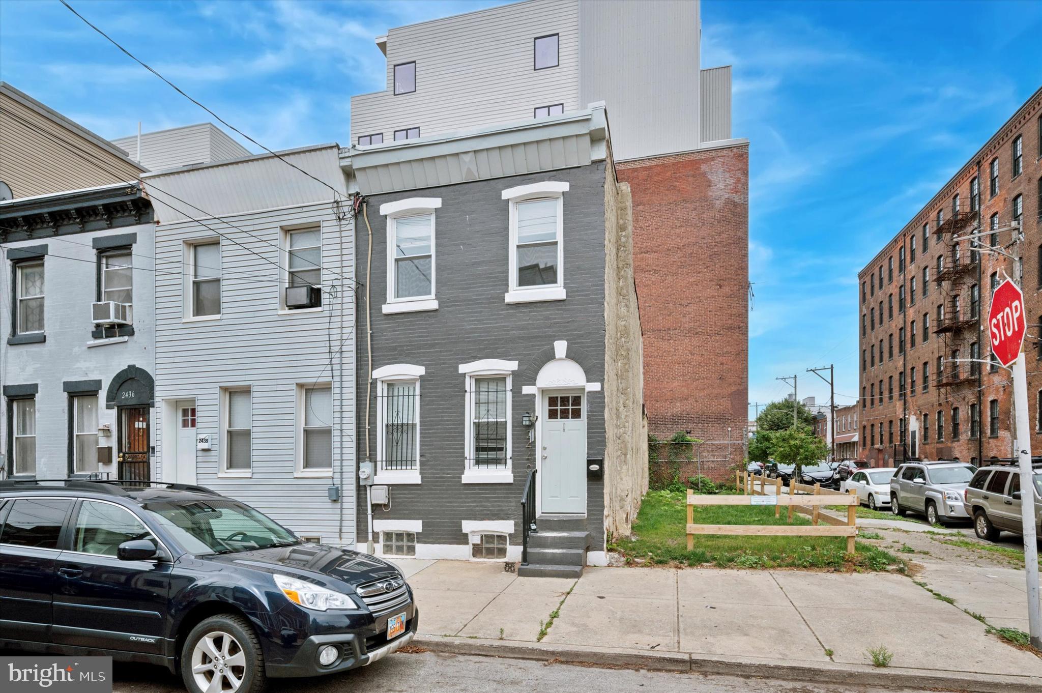 Welcome to 2440 Jasper Street, a charming 2-bedroom, 1-bath townhouse nestled in the heart of East Kensington—just steps from Fishtown and some of Philadelphia’s most dynamic restaurants, cafes, and nightlife. This classic brick rowhome offers over 1,000 square feet of thoughtfully updated living space, making it an excellent opportunity for first-time buyers, savvy investors, or anyone looking to enter one of Philly’s most sought-after neighborhoods at an approachable price point. Inside, you'll find a bright and flexible floor plan featuring high ceilings, pocket lighting and durable vinyl plank flooring throughout. The main level includes a cozy living area and a versatile bonus room—ideal for a home office, reading nook, or even a third bedroom. The beautifully updated kitchen, renovated in 2023, boasts white shaker cabinets, granite countertops, a sleek subway tile backsplash, and stainless steel appliances—blending style and function seamlessly. Just off the kitchen, step out to a private, fenced-in patio—perfect for morning coffee, evening relaxation, or summer entertaining. Upstairs, two generously sized bedrooms offer comfort and ample closet space, including a spacious primary bedroom. The full bathroom was also updated in 2023 and features modern, tasteful finishes for a clean, contemporary feel. Additional perks include a large basement with a washer and dryer and plenty of storage space. With easy access to the El and the I-95 corridor, commuting is a breeze. Surrounded by some of the best that East Kensington and Fishtown have to offer: grab coffee at Hello Donuts + Coffee, brunch at Martha or Forin Café, enjoy dinner and cocktails at Picinic, Philadelphia Brewing Company, or Pizzeria Beddia, and shop local at boutiques and galleries like Jinxed and Downers. City Fitness, Suraya, and La Colombe are all within a short stroll as well.
