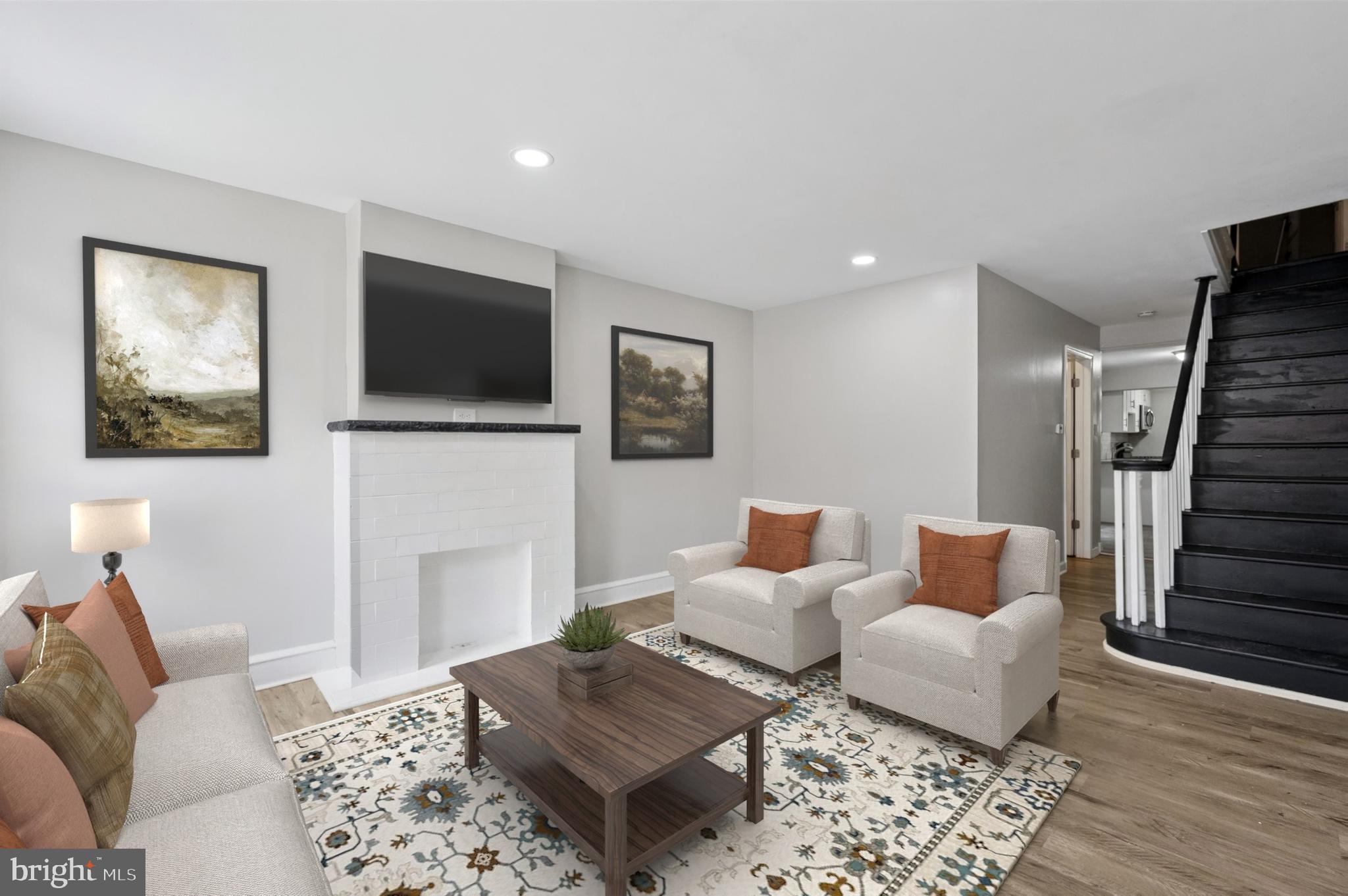 Welcome to 2440 Jasper Street, a charming 2-bedroom, 1-bath townhouse nestled in the heart of East Kensington—just steps from Fishtown and some of Philadelphia’s most dynamic restaurants, cafes, and nightlife. This classic brick rowhome offers over 1,000 square feet of thoughtfully updated living space, making it an excellent opportunity for first-time buyers, savvy investors, or anyone looking to enter one of Philly’s most sought-after neighborhoods at an approachable price point. Inside, you'll find a bright and flexible floor plan featuring high ceilings, pocket lighting and durable vinyl plank flooring throughout. The main level includes a cozy living area and a versatile bonus room—ideal for a home office, reading nook, or even a third bedroom. The beautifully updated kitchen, renovated in 2023, boasts white shaker cabinets, granite countertops, a sleek subway tile backsplash, and stainless steel appliances—blending style and function seamlessly. Just off the kitchen, step out to a private, fenced-in patio—perfect for morning coffee, evening relaxation, or summer entertaining. Upstairs, two generously sized bedrooms offer comfort and ample closet space, including a spacious primary bedroom. The full bathroom was also updated in 2023 and features modern, tasteful finishes for a clean, contemporary feel. Additional perks include a large basement with a washer and dryer and plenty of storage space. With easy access to the El and the I-95 corridor, commuting is a breeze. Surrounded by some of the best that East Kensington and Fishtown have to offer: grab coffee at Hello Donuts + Coffee, brunch at Martha or Forin Café, enjoy dinner and cocktails at Picinic, Philadelphia Brewing Company, or Pizzeria Beddia, and shop local at boutiques and galleries like Jinxed and Downers. City Fitness, Suraya, and La Colombe are all within a short stroll as well.