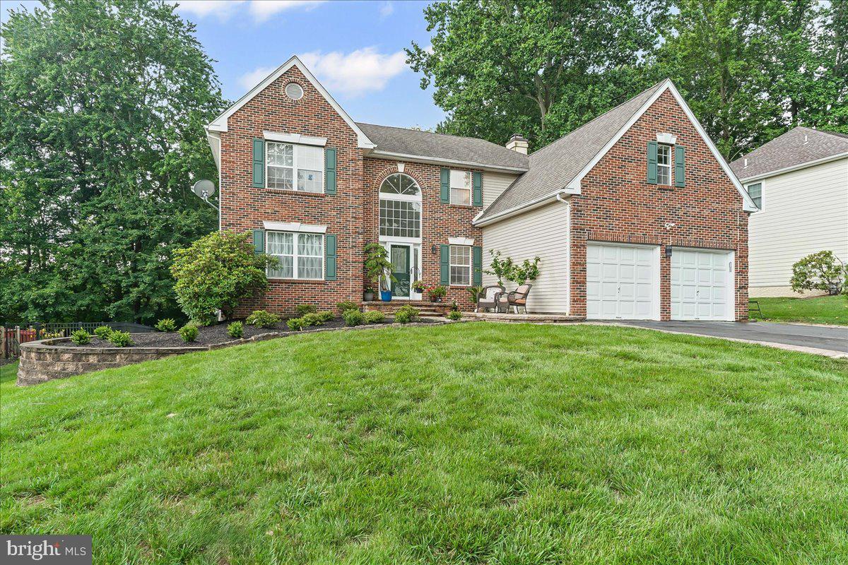 Welcome to Garnet Oaks, a sought after development with sidewalks, walking path and newer play ground in Garnet Valley Schools! Bethel Springs Elementary! On a premium lot, backing up to common area, this home is ready for its new owner. Great curb appeal with decorative paver entrance with built in lighting and new exterior fixtures. Nice layout here for this Realen Homes WIliamsburg Federal Essex Series. Eat in Kitchen with granite counters and bar height Island. Stainless appliances including new gas stove ( 2023) and dishwasher (2022) and new lighting. There is an adjacent family room with gas fireplace and sliders to a nice deck and private back yard. Spacious formal living room and dining room. There is a main floor laundry room and powder room. Second floor features a large primary suite, a private bath with soaking tub and dual sinks. The walk in closet has been enlarged with an additional closet/office/storage area. There are 3 additional good size bedrooms and a hall bath. The full basement is partially finished with built in storage and entertainment center. There is an office, work room with big closets and shelving. More storage and utilities to the rear of the finished sections. The 2 car garage is oversized and the expanded driveway can hold at least 4 cars! Can't see enough about the fabulous lot and location, close to all major roads, 322, I -95, DE Tax Free Shopping, Costco, Dog Parks and Walking Trails! Also included is a 1 year AHS Home Warranty so make your appointment today!