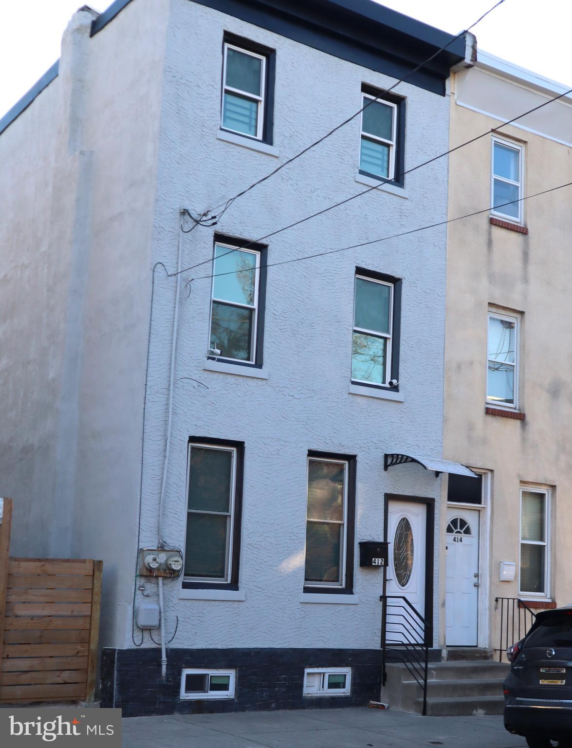 Welcome to 412 West Norris St, a hidden gem nestled in the highly sought-after Norris Square neighborhood. This remarkable property presents an exceptional investment opportunity, perfectly positioned near the vibrant and rapidly developing American Street corridor. Experience the epitome of city living with the convenience of being just a short stroll away from subways, grocery stores, gyms, and the lively Fishtown area to the east, as well as Temple University to the west. Plus, enjoy effortless access to I-95, making trips to South Jersey a breeze.
As you step inside, you'll be captivated by the seamless blend of modern comfort and timeless charm that defines the open-concept living room and kitchen. The first floor showcases soaring high ceilings, elegant hardwood floors, and expansive windows that flood the space with natural light, creating an inviting and airy atmosphere. Ascend to the second floor, where you'll find a generously sized front bedroom, a cozy mid-sized bedroom, and a stylish full bathroom. The third level is home to two additional versatile bedrooms, perfect for guests or a home office.
Don’t miss your chance to schedule a showing today and discover the boundless potential this extraordinary property has to offer!