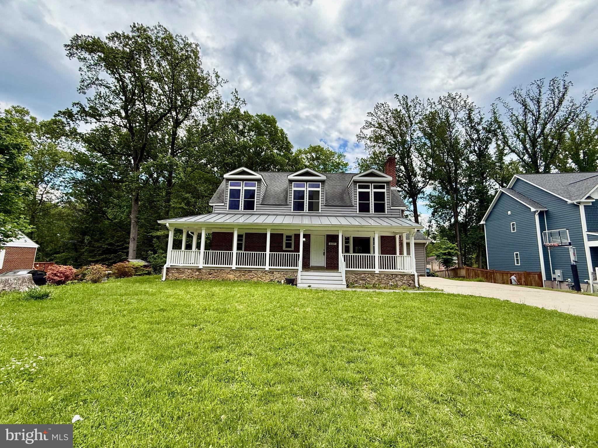 Spacious and well-appointed 5 bedroom, 5 bath home ideally located just off Old Keene Mill Road in Springfield. The main level features an open-concept kitchen with granite countertops and stainless steel appliances, two bedrooms, a full bathroom, and a rear family room with views of the private backyard.
Upstairs, you’ll find three additional bedrooms, two full bathrooms, and a convenient laundry room. The finished basement offers three separate rooms, ample storage, and another full bath—providing flexible space for a home office, gym, and craft room!
Enjoy outdoor living with a large wraparound front porch and a trellis-covered deck perfect for relaxing or entertaining. A wonderful opportunity in a sought-after location with easy access to commuter routes, shopping, and schools.