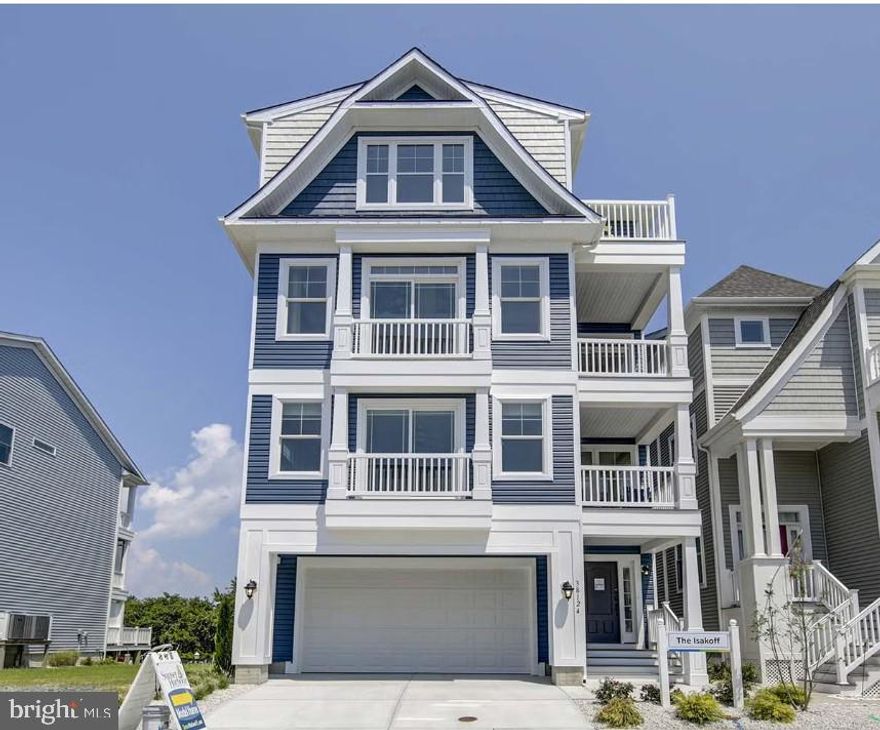 Insight Homes is taking the guess work out of developing this stunning bayfront property located just blocks from the beach!  They have a 4-story home design that will fit on this rare bayfront building lot and have already selected the structural options that they think would enhance this home.  After purchasing and settling on the building lot from the current owners for $2,700,000 the option to proceed with Insight Homes to build their Isakoff home becomes a smooth and easy process.  Insight Homes has carefully chosen all of the structural options they think you would love and the price of the home itself ($1,534,068) includes a $175,000 designer allowance to give the buyer the freedom to choose their own finish selections at Insight Home's design studio.  Structural options already made by the builder can still be modified which could increase or decrease the price of the home.   The only structural option that must be made is a side-entry garage and the builder has included an estimated contingency amount in the quoted price for this structural change.  An estimated site cost allowance is also included in the price of the home.  Pictures provided in listing are of Isakoff model home and do not reflect specific options that were selected for this potential build but provide an example for potential buyers to get a real feel for all that this 4-story home and all that it has to offer.  Imagine the water and city views from 10 different outdoor spaces, including porches, decks, and balconies.  The Isakoff will feature an elevator and owned solar panels to add to this already energy efficient home.  This is a once in a lifetime opportunity to own an undeveloped southern exposure bayfront parcel of land in Ocean City, MD.  Enjoy incredible sunsets from your home once this property is developed and live a convenient relaxing lifestyle with a short walk or bike ride to the beach.  Lot lines on pictures were completed by the photographer and are for demonstration only.  Buyers should rely on the recorded subdivision plat attached to the listing for lot line placement.  No builder tie-in. Option to build with Insight Homes is just that, an option.