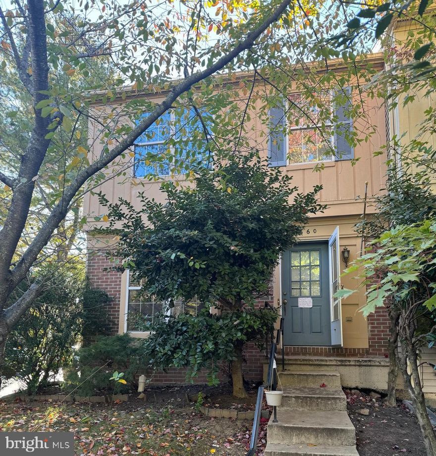 This spacious three level end unit townhome  conveniently located in the Paradise community. The main level open concept living & dining rooms offer great living space. The kitchen with access to rear two level deck & fenced rear yard. The upper level features three spacious bedrooms & two full baths including private primary suite with walk-in closet. The finished lower level features spacious recreation room with fireplace, full bath & storage. Updated HVAC system, updated water heater, two assigned parking spaces & more. Incredible location near local shopping, schools & commuter routes.