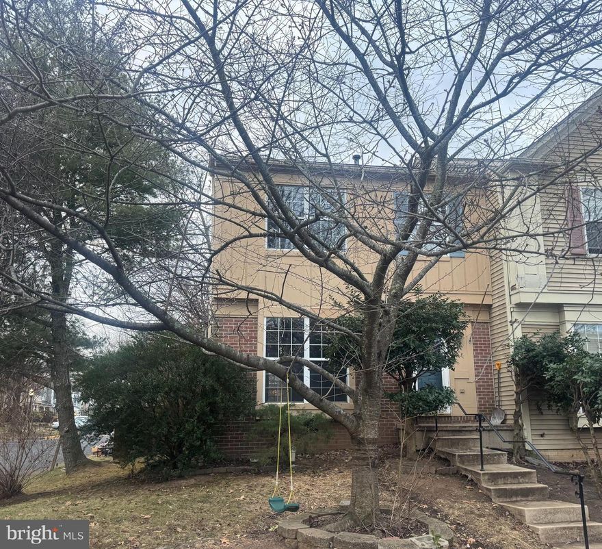 This spacious three level end unit townhome  conveniently located in the Paradise community with fresh paint. The main level open concept living & dining rooms offer great living space. The kitchen with access to rear two level deck & fenced rear yard. The upper level features three spacious bedrooms & two full baths including private primary suite with walk-in closet. The finished lower level features spacious recreation room with fireplace, full bath & storage. Updated HVAC system, updated water heater, two assigned parking spaces & more. Incredible location near local shopping, schools & commuter routes. Photos will be uploaded Tuesday January 13!