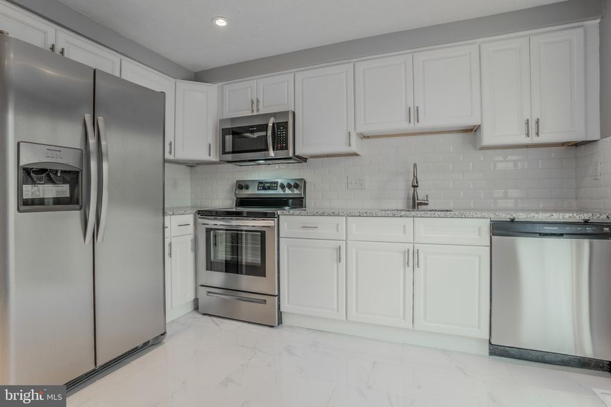 Great new home with everything upgraded. New kitchen, baths, and flooring. Don't miss this opportunity to own!