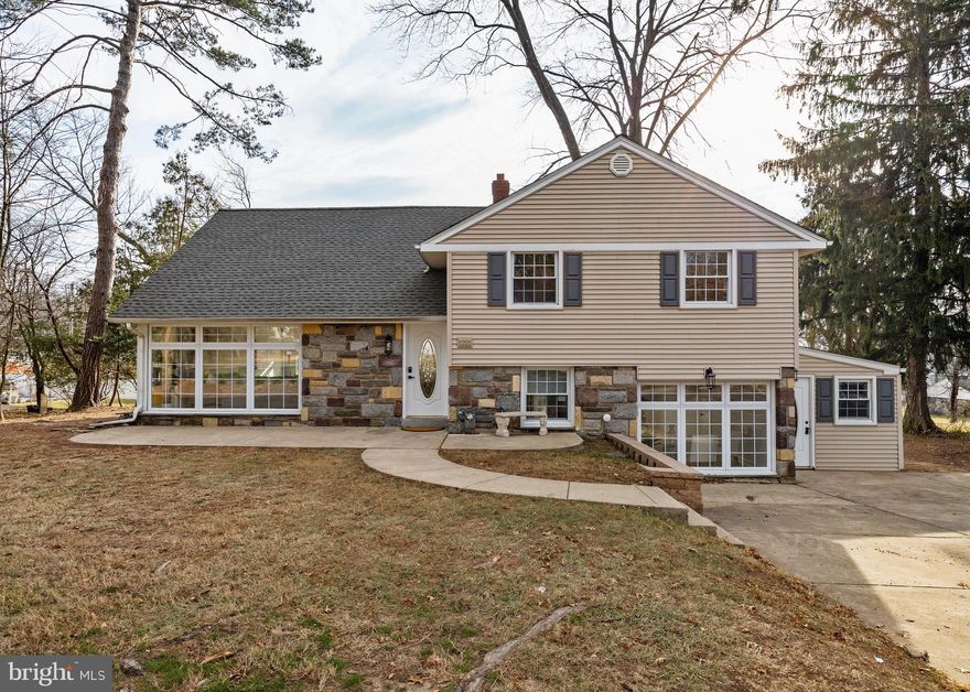 Beautifully renovated 4-bedroom, 3-bath split-level home in Huntingdon Valley. The bright main level offers red oak hardwood floors, a tiled dining area, and a beautifully redesigned kitchen showcasing a large island, sleek finishes, and new Samsung appliances. The upper levels include a primary bedroom with its own master bathroom, two additional bedrooms with an updated hall bath, and a spacious loft-style fourth bedroom. The lower level includes a multi-functional family/entertainment room with access to the rear patio, a private office, an additional kitchen, and a full bathroom-making it ideal as an in-law suite or for multi-generational living. Enjoy a large backyard and ample off-street parking. Conveniently located near Rydal Elementary, parks, shopping, and major routes, this home offers modern updates, comfort, and exceptional value in a prime Huntingdon Valley location. Additional upgrades include a brand-new roof. A beautifully updated gem you won’t want to miss!