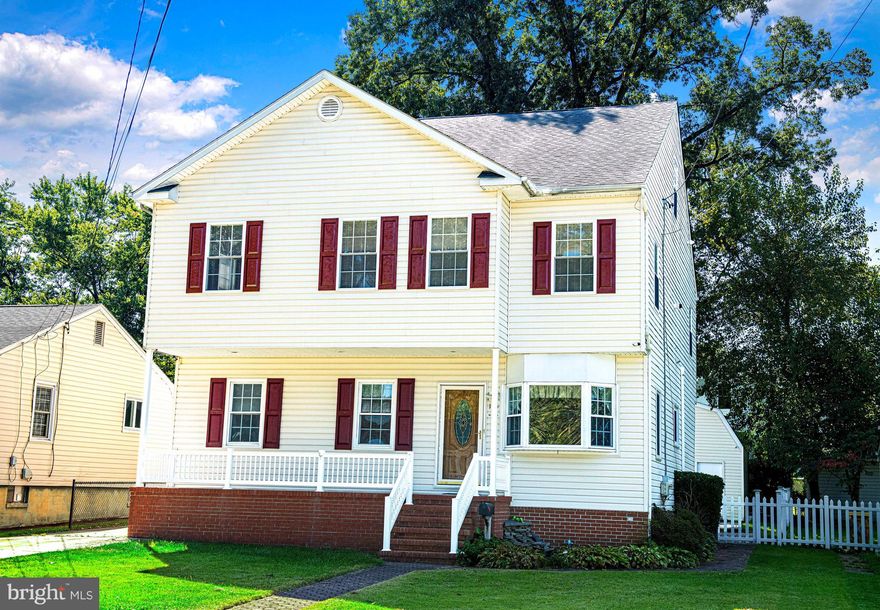 SPACIOUS COLONIAL WITH COVERED FRONT PORCH FEATURING 6 BEDROOMS AND 4 FULL BATHROOMS—IDEAL FOR MULTIGENERATIONAL LIVING. INTERIOR HIGHLIGHTS INCLUDE WOOD FLOORS, CROWN MOLDING, CHAIR RAIL, DUAL-ZONE HEATING AND AIR, TANKLESS WATER HEATER, AND BOW WINDOW. THE MAIN LEVEL OFFERS A LARGE LIVING ROOM WITH DINING AREA, TWO MAIN-LEVEL BEDROOMS, A FULL BATHROOM WITH JETTED TUB, AND A KITCHEN THAT OPENS INTO AN EXPANSIVE FAMILY ROOM WITH AN ADDITIONAL DINING SPACE, 10-FOOT CEILINGS, AND A GAS FIREPLACE. THE UPPER LEVEL FEATURES FOUR WELL-SIZED BEDROOMS WITH 9-FOOT CEILINGS, A COMBINATION OF WOOD FLOORS AND CARPET, WALK-IN CLOSETS, A HALLWAY FULL BATHROOM, AND A LAUNDRY ROOM. THE SPACIOUS PRIMARY SUITE INCLUDES A WALK-IN CLOSET AND AN EN SUITE BATHROOM WITH JETTED TUB, CERAMIC TILE, DOUBLE VANITY, AND SEPARATE WALK-IN SHOWER. THE FINISHED LOWER LEVEL OFFERS A LARGE RECREATION ROOM, BONUS ROOM PERFECT FOR A DEN OR OFFICE, A FULL BATHROOM, AND AN ADDITIONAL KITCHEN/WET BAR WITH FRIDGE—CREATING EVEN MORE SPACE TO RELAX AND ENTERTAIN. THE WALK-UP ATTIC HAS DEDICATED STAIRS, FULL STANDING ROOM, AND THE POTENTIAL TO BE FINISHED AS ADDITIONAL LIVING SPACE, WITH AMPLE STORAGE. OUTSIDE, ENJOY A LARGE STORAGE SHED, FENCED YARD, AND GENEROUS PAVER PATIO COMPLETE WITH FIREPIT AND A WATER FEATURE WITH GAS FIRE—PERFECT FOR ENTERTAINING. FRONT LANDSCAPING INCLUDES A PAVER WALKWAY AND AN ADDITIONAL WATER FEATURE. PLENTY OF PARKING WITH A SEPARATE DRIVEWAY. CONVENIENTLY LOCATED NEAR COMMUTER ROUTES, MAJOR THOROUGHFARES, PARKS, RESTAURANTS, SHOPPING, BWI AIRPORT, LIGHT RAIL, AND MORE.