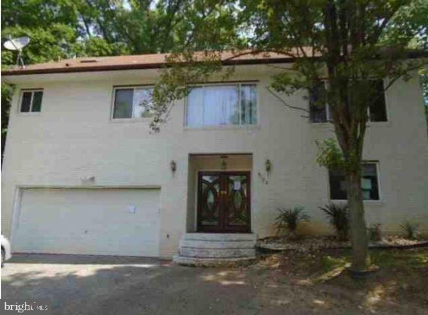 Built in 2002 and located in the Treasure Cove neighborhood, this home offers approximately 1211 finished square feet, one bedroom and one full bath, partially finished basement, rear deck and built in two car garage. This home sits on an  approximate 9871 sqft lot.