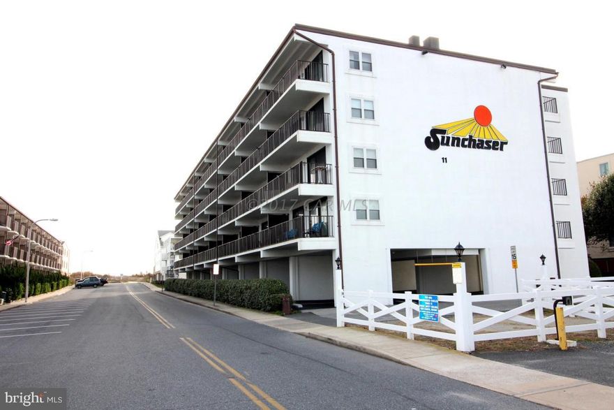 You'll enjoy both ocean and bay views from the large private balcony of this top floor, spacious 2BD, 2BA mid-rise, masonry, condo located on the ocean block in Mid-Town Ocean City convenient to the beach, boardwalk, shopping and amusements, AND you'll have a front row seat to the fireworks from Seacrets & see OC and Pines displays as well!   This immaculately maintained, tastefully decorated unit with wet bar and ample storage is sold fully furnished and move in ready. HVAC and hot water heater have been recently replaced. The well cared for  building has a keyed elevator and 2 parking spaces.