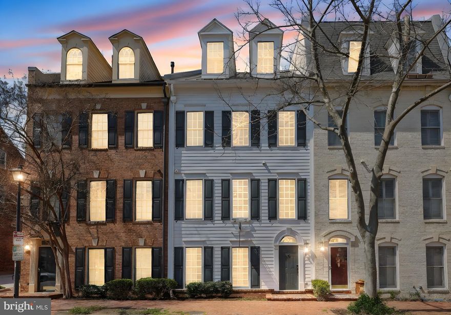 Located in the coveted Chatham Square, this fully renovated (2025) and move-in-ready townhouse offers the perfect blend of style, comfort, and prime location in Old Town Alexandria. Nestled in the heart of this sought-after neighborhood, this beautifully upgraded EYA home boasts a Walk Score of 96, placing you steps away from Trader Joe’s, Harris Teeter, award-winning dining, and the vibrant Alexandria waterfront.

Enjoy an unbeatable location surrounded by scenic beauty. Begin your mornings with walks along the picturesque Potomac River and explore nearby parks such as Tide Lock Park, Rivergate City Park, Oronoco Bay Park, and Founders Park. This prime setting offers a rare balance of city convenience and peaceful green spaces, making it the perfect place to call home.

A rare find in Old Town, this property features a secured common area garage parking with two dedicated spaces and direct home access—an exceptional luxury in this historic district. Additionally, a private storage room conveniently located near the parking area provides extra space for your needs.

Completely renovated in 2025, no detail has been overlooked in the transformation of this home. The bathrooms have been fully updated with modern finishes, including anti-fog frameless mirrors, upgraded hardware, and redesigned layouts. The kitchen has been reimagined with brand-new stainless-steel appliances, quartz countertops, a custom tile backsplash, and a chef-preferred gas stove. The laundry room now boasts new flooring, cabinetry, a stylish backsplash, and a full-size washer and dryer. Other upgrades include a redesigned fireplace with a sleek tile surround, updated LED light fixtures throughout, freshly painted interiors, a brand-new water heater and furnace, refinished hardwood flooring and staircase, and a smart digital front door lock.

Step inside and experience stylish interiors designed for modern comfort. The inviting open floor plan features gleaming hardwood floors and plush carpet in the bedrooms. The main level showcases a beautifully upgraded kitchen with white shaker cabinets, sleek hardware, and an oversized island—perfect for entertaining. A cozy gas fireplace and a modern powder room complete this sophisticated space.

Upstairs, retreat to the luxurious primary suite, which offers two walk-in closets and a spa-inspired bathroom featuring a double quartz vanity, soaking tub, walk-in shower, and contemporary tile flooring. A fully updated laundry room adds everyday convenience. The top floor provides two spacious bedrooms with vaulted ceilings and an updated full bath with quartz finishes—ideal for guests, a home office, or additional family space.

This turn-key residence offers extensive renovations, rare garage parking, generous storage, and an unbeatable location, making it truly move-in ready. Don't miss this incredible opportunity to own a stunning home in one of Old Town Alexandria’s most desirable communities.