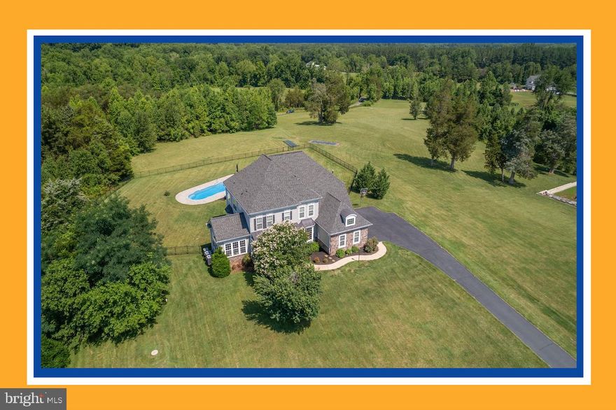 Have you been waiting for the Next GLENS Property? Another week or so and you can visit this 2010 Turnkey Beauty sited well back off of Lupine Drive for Endless Sunsets by the Pool! Enjoy the photos and notice all the extras on this open concept Signature Augustine Home. Start your journey from your stately driveway monuments up the drive (great event/gathering parking BTW) to your elevated well sited acreage retreat. The  front porch relaxation feels grounded by the slate finishing with beautiful landscape and hardscape already set. Inside you are greeted by all you might expect in hardwoods, LVP and ceramics. Great main level office for organized remote work with High Speed Xfinity Internet. One of Owner's favorite spots is the front Sunroom and Yes the hanging bed swing conveys. Kitchen, back sunroom, living room are all light filled, open and wonderful for gatherings and the day to day flow of life. Kitchen is finished out with granite, stainless, island, pantry and upgraded cabinetry to be expected. Upper level amenities include the 4 bedrooms with 3 full baths, abundant closet space, high ceilings, closet organizers, LVP, laundry and again full of light. The lower level is partial built out with bedroom with full bath, recreation room, full bar with amenities and open game area. Step outside to the wonderland of western elevated exposure and enjoy the salt water fiberglass pool, the stamped concrete, the cabana and the wooded view for miles. A few note-able extras include tons of crown molding, shake and stone exterior accents, iron stair spindles, box beam ceiling, gas fireplace, lower level appliances/wet bar and great lower storage space. The owners are finishing up the prep work to deliver in Certified style including home inspection, hvac, septic and termite all underway or completed pre-list, GoReady! The owners have loved the views, the neighborhood, the lighting, the home siting that includes backyard breezes by the pool, the functionality, the finishes, the entertaining, yes..that side sunroom and all the grand memories, but time to relocate, so now your opportunity awaits! See you soon at 28 Lupine!