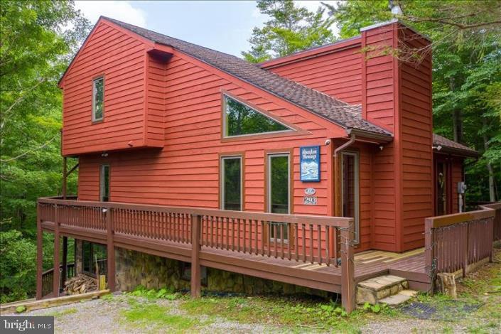 Timberline Ski Resort – Davis, WV 4 bedroom, 100% completely remodeled (2013) 3.5 bath contemporary Home aka “Abundant Blessings”. 2,872 sq. ft. of comfortable living space spread out over 3 full floors. Upper floor offers 2 bedrooms w/ balconies & full bath w/ shower soaking tub. Main floor master suite w/ private bath. Fully equipped kitchen/dining room combo. Living room w/ field stone fireplace and vestibule. Walk-out level lower floor w/ 4th bedroom, den and family room w/ stone fireplace and gaming room. Drive way in front side of home and below side of home. Year-round creek. Home sits at top of Salamander Ski/Hike Trail with a direct walk over to the ski trail. Hike up mountain to Dolly Sods wilderness trail crossover. Produces high Annual Rental Income!