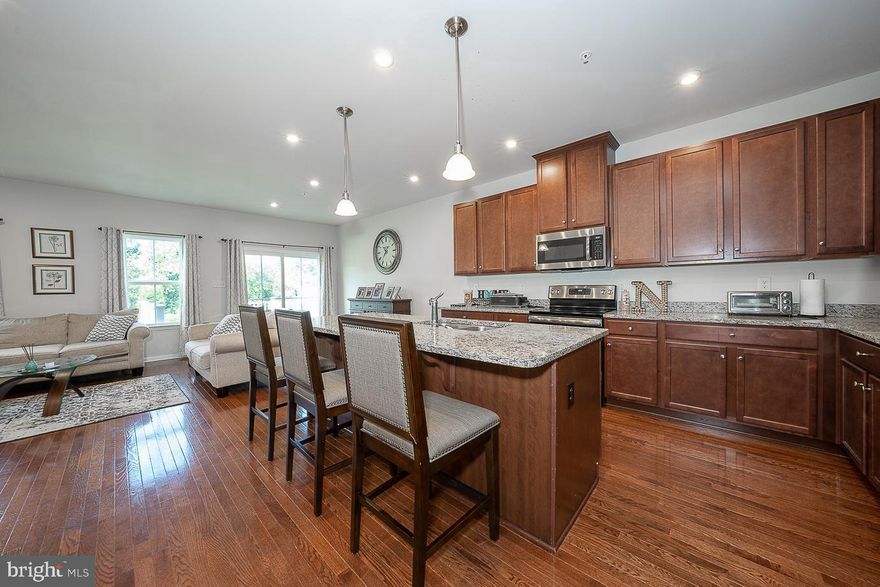 Beautiful townhome built in 2018 located in the wonderful community of Montgomery Square. With close proximity to multiple shopping centers, restaurants, Septa Regional Line, route 309 and 476. 
Spacious primary bedroom and two guest bedrooms, all with ample closet space. Large walk in laundry room located on the 2nd floor. Huge finished basement perfect for a home theater and additional space for a home gym or a fourth bedroom. Grand kitchen is a chefs dream, fully equipped with desirable cabinetry, stainless steel appliances, oversized island and lots of counter space. Exit through your sliding doors to enjoy your large deck and backyard oasis. Enjoy grilling, outdoor entertaining and your favorable greenspace year round.