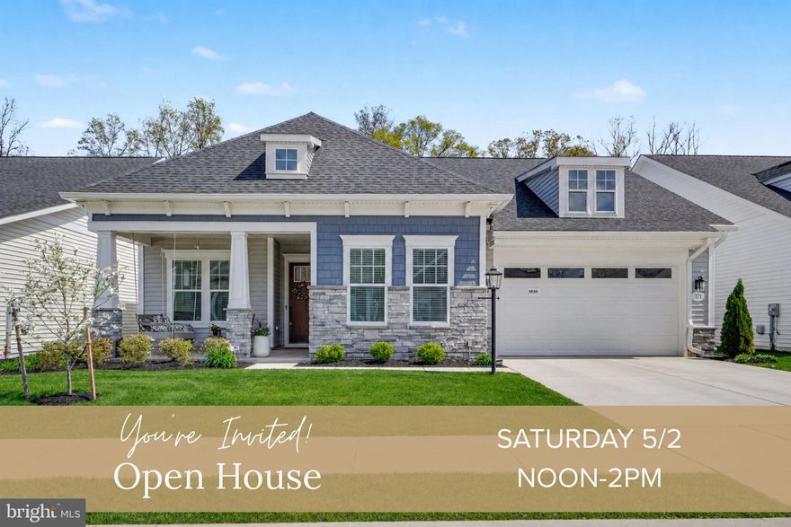 Welcome to The Quiet Creek House, a beautifully upgraded, move-in ready home in the heart of Amblebrook, a premier 55+ community designed for easy, resort-style living. Set on a premium lot backing to peaceful trees, this 2,400 square-foot home offers privacy, space, & thoughtful design throughout. From the charming front porch & timeless exterior with shaker siding, stone accents, & stately columns, to the soaring 10-foot ceilings inside, every detail feels warm & inviting.

Glass doors open to a private study that can easily serve as a third bedroom, while a guest bedroom & full bath are thoughtfully tucked away for comfort. The open-concept living area is anchored by a stunning kitchen with an oversized quartz island, KitchenAid gourmet appliances, & farmhouse sink. A butler’s pantry & spacious walk-in pantry provide exceptional storage, along with abundant cabinetry throughout. The subway tile backsplash extends all the way to the ceiling, adding a timeless designer touch. The kitchen flows seamlessly into a light-filled dining area, an open living room with a gas fireplace & custom built-ins, creating the perfect setting for both everyday living & entertaining.

The expanded primary suite is a true retreat. A custom trim accent wall adds character & warmth to the space. The ensuite bath features dual oversized vanities, a large tiled shower, & a private water closet. An impressive walk-in closet offers generous storage & connects directly to the laundry room, complete with built-ins, granite countertops, & a utility sink.

A heated four-season room extends your living space year-round. It features luxury vinyl plank flooring and stunning floor-to-ceiling windows that fill the space with natural light. Step outside to a fenced backyard featuring a beautifully hardscaped patio with a gas line ready for summer grilling. A full yard sprinkler system keeps the landscaping lush and low-maintenance.

 Additional highlights include an oversized two-car garage & a dedicated bulk storage room with built-in shelving for exceptional organization.

With indoor and outdoor resort-style pools, pickleball courts, a coffee shop, a state-of-the-art fitness center, and weekly social activities, life at Amblebrook truly feels like a vacation every day. Come experience the stunning details for yourself and schedule your private tour today.