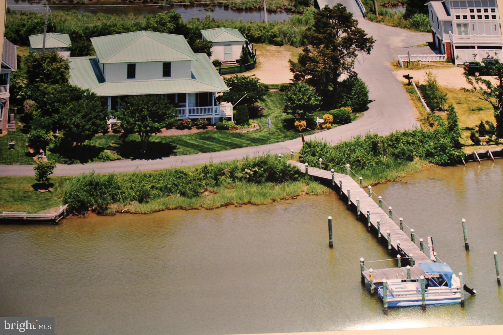 Custom Waterfront w/ Unique Design on protected Neale Sound and minutes to the Potomac. This home is beautiful inside & out with wonderful views and atmosphere. Relax on the porch, your own private dock or jump in your boat and go! Beautiful hardwoods, and upscale construction materials throughout. 2 Story Family Room, Gourmet Kitchen, Dining & Master Suite all on first floor! Heat/AC 2 years old