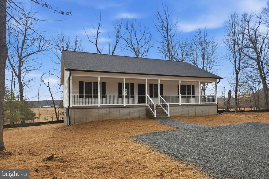 Welcome to this charming 1,400 sq. ft. main-level living home, on 5.37 secluded acres offering privacy and peaceful pasture and wooded views. This beautifully built 3-bedroom, 2-bath combines comfort, style, and efficiency. Step inside to find luxury vinyl flooring throughout the main living areas, creating both durability and modern appeal. The open-concept layout provides a welcoming flow, ideal for everyday living and entertaining. The kitchen features elegant granite countertops, energy-efficient stainless steel appliances, walk in pantry and ample cabinet space, making it as functional as it is stylish.The spacious primary suite offers a relaxing retreat, complete with a walk-in shower in the private bath. Two additional bedrooms provide flexibility for guests, a home office, or hobbies.Enjoy the beauty of nature from your private deck—perfect for morning coffee, evening sunsets, or simply taking in the tranquil surroundings. The unfinishedwalkout basement include a rough in for a third bath and endless possibilites for your design. With expansive acreage, picturesque views, and true seclusion, this property offers the perfect blend of comfort and countryside living. Make this peaceful retreat your home. Professional Photography coming soon.