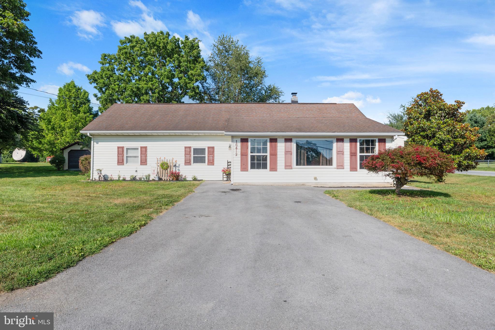 If you are looking for one level living in a scenic setting, 16412 Spielman is for you! This 3bd/1ba rancher has been nicely updated and offers plenty of space inside and out! Natural light pours in through the front addition's windows and is perfect for enjoying your morning coffee or as a mudroom. The living room is spacious and offers plenty of room for entertaining. The kitchen is well-appointed and offers ample cabinetry and prep space for all of your home chef needs. There are two guest bedrooms, each with large closets, plus a hall bathroom. The primary bedroom is spacious and offers light from all angles and is large enough to fit a king sized bed. The rear yard is great for entertaining on summer nights and is adorned with a stone patio. Stop in today to explore all that 16412 Spielman Rd has to offer!