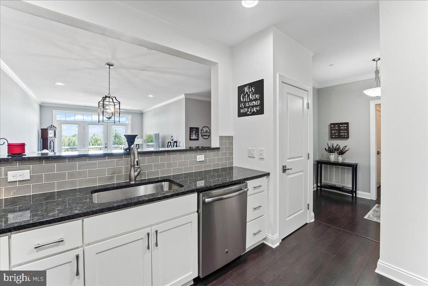 Welcome to the inviting and sought-after 55+ community of Westtown Reserve, nestled in the heart of West Chester, PA. Embrace a carefree lifestyle as you step into this charming residence, where comfort and convenience intertwine seamlessly.
Upon entering, your eyes will be drawn to the stunning open chef's kitchen, adorned with a captivating tile backsplash that adds a touch of elegance.  Sleek stainless steel appliances stand ready to assist you in culinary creations, while a generously sized pantry offers ample storage space. The kitchen flows gracefully into the luminous dining area and family room, creating a delightful space for both everyday living and entertaining.
Immerse yourself in the warmth of the gleaming hardwood floors that grace the entirety of this home. These floors not only radiate beauty but also promise resilience, making them the ideal blend of style and practicality.
A private sanctuary awaits as you step onto the terrace adjacent to the family room. This serene oasis provides the perfect backdrop for your morning coffee rituals or a tranquil retreat to unwind after a fulfilling day.
Journey down the hallway and discover the expansive primary bedroom, thoughtfully designed to be flooded with natural light. Envision mornings bathed in sunlight and rejuvenating evenings in this harmonious haven. The primary bathroom impresses with its dual sinks, offering convenience, and a spacious walk-in shower that beckons relaxation. The grand walk-in closet is tailor-made for housing your cherished wardrobe.
A second bedroom offers a cozy space for guests or could serve as a versatile home office. The well-appointed full-hall bathroom provides comfort and functionality.   A laundry room and substantial storage space offer a true blend of utility and organization. 
Step into the underground gated and secured garage, a pristine space illuminated by meticulous lighting. Your reserved parking spot awaits, accompanied by a designated secure storage area. Visitor parking is plentiful, ensuring convenience for your guests.
The community extends its gracious offerings with a fitness center, library, and conference room, all available for your enjoyment. Revel in the beauty of the great outdoors as you explore the charming gazebo, walking trails, and bike paths. 
Experience a lifestyle that embodies safety, security, and ease - one that you've been patiently waiting for. Make Westtown Reserve your home and savor the pleasures of a vibrant community tailored to your desires. Your new chapter begins here.