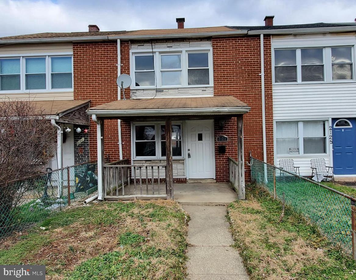 Welcome Home!! Renovated Rowhouse features - Open floor plan, Hardwood floors, New Appliances, Washer and Dryer -Newly Remodeled Bathrooms AND Off-Street parking A MUST SEE!!